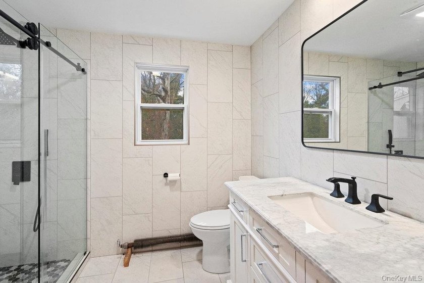 Welcome to 43 Van Nostrand Avenue, an updated 3-bedroom - photo 19