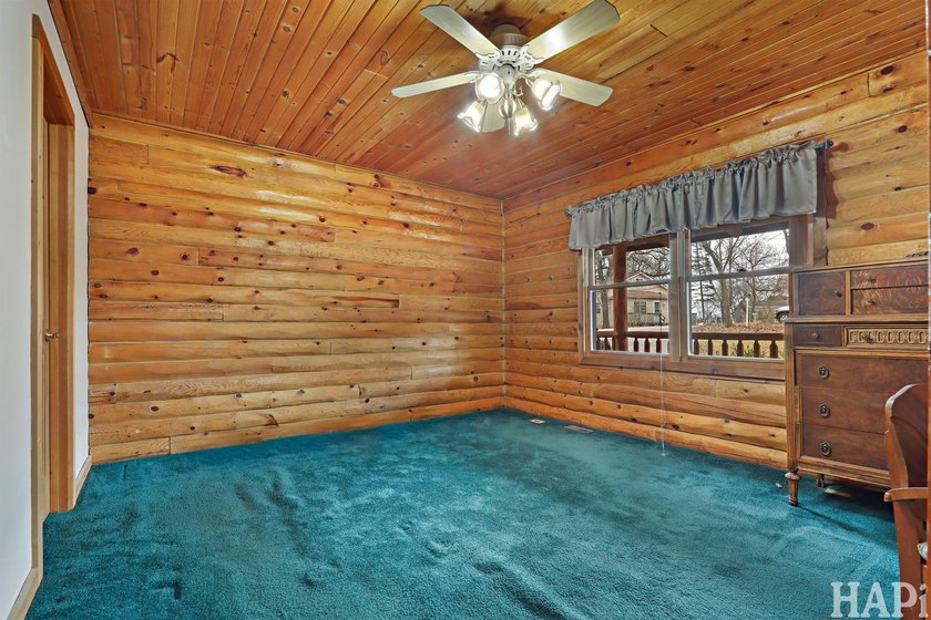 Welcome to this beautiful waterfront log home tucked away on a - photo 11