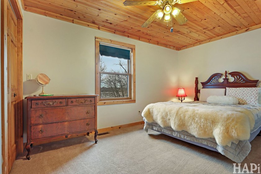 Welcome to this beautiful waterfront log home tucked away on a - photo 15