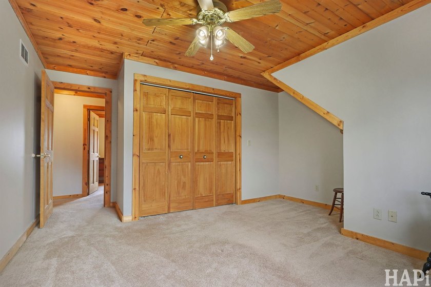 Welcome to this beautiful waterfront log home tucked away on a - photo 17