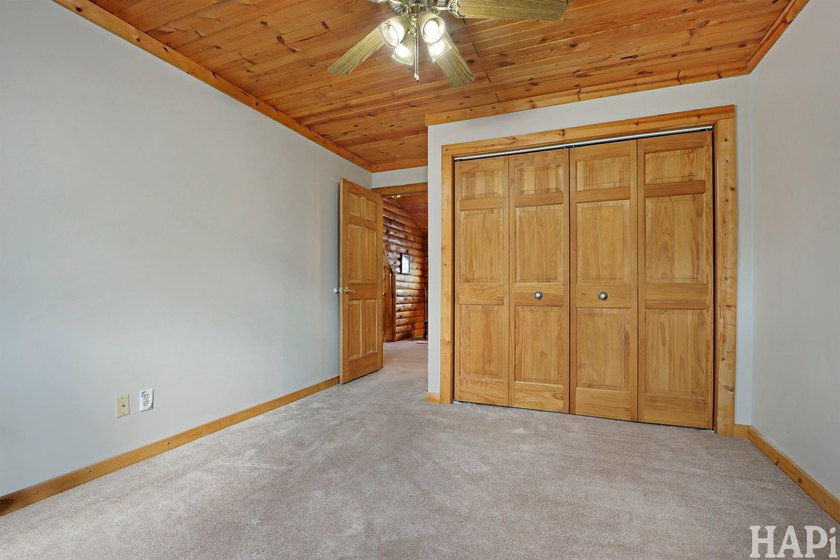 Welcome to this beautiful waterfront log home tucked away on a - photo 19