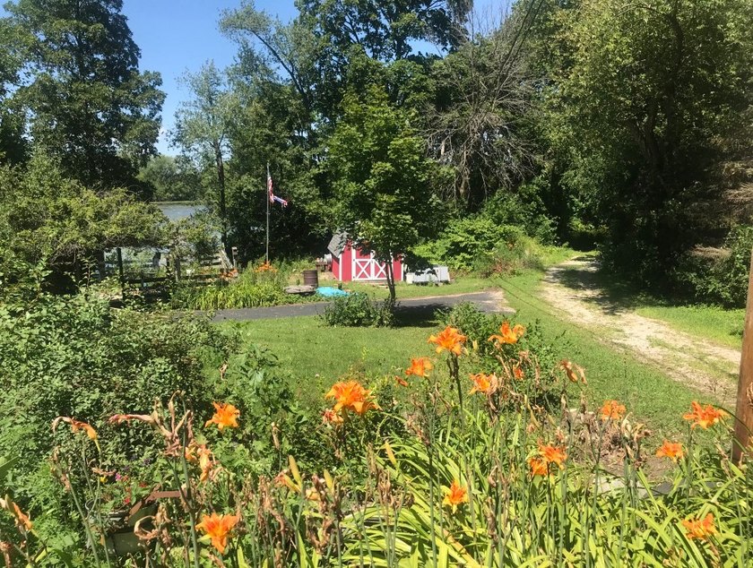 Welcome to this beautiful waterfront log home tucked away on a - photo 26