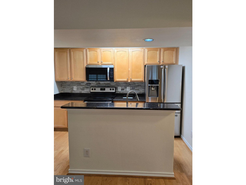 Discover the charm of Penderbrook Square Condominiums, where - photo 6