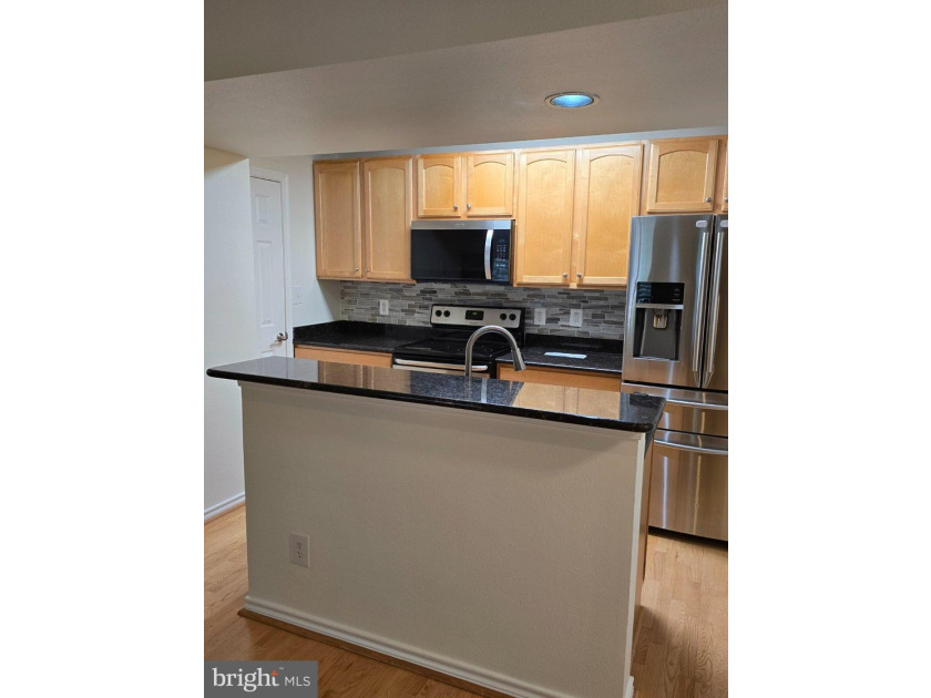 Discover the charm of Penderbrook Square Condominiums, where - photo 7