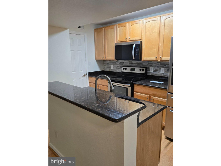 Discover the charm of Penderbrook Square Condominiums, where - photo 8