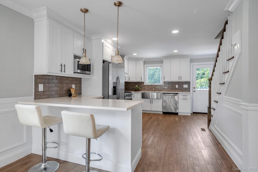 Welcome to this beautifully renovated Colonial in the heart of - photo 2