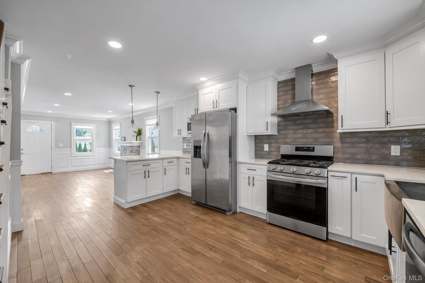 Welcome to this beautifully renovated Colonial in the heart of - photo 4