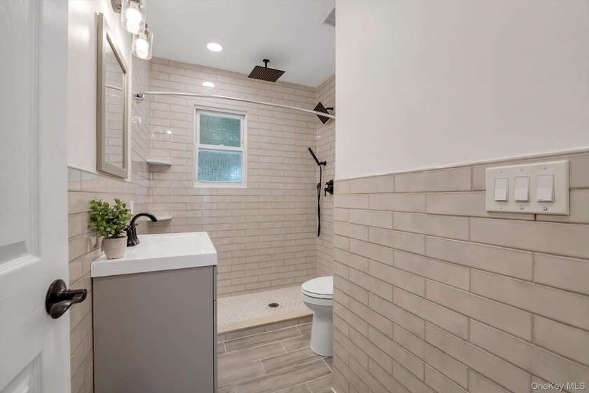 Welcome to this beautifully renovated Colonial in the heart of - photo 9