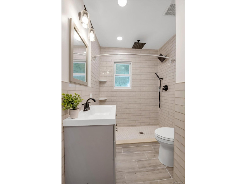 Welcome to this beautifully renovated Colonial in the heart of - photo 10