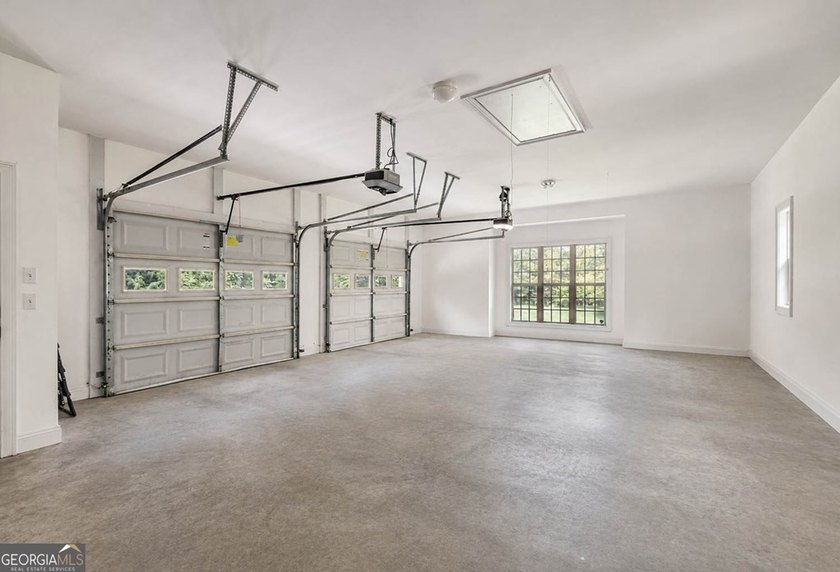 Set well back from the road and surrounded by 36 private acres - photo 36