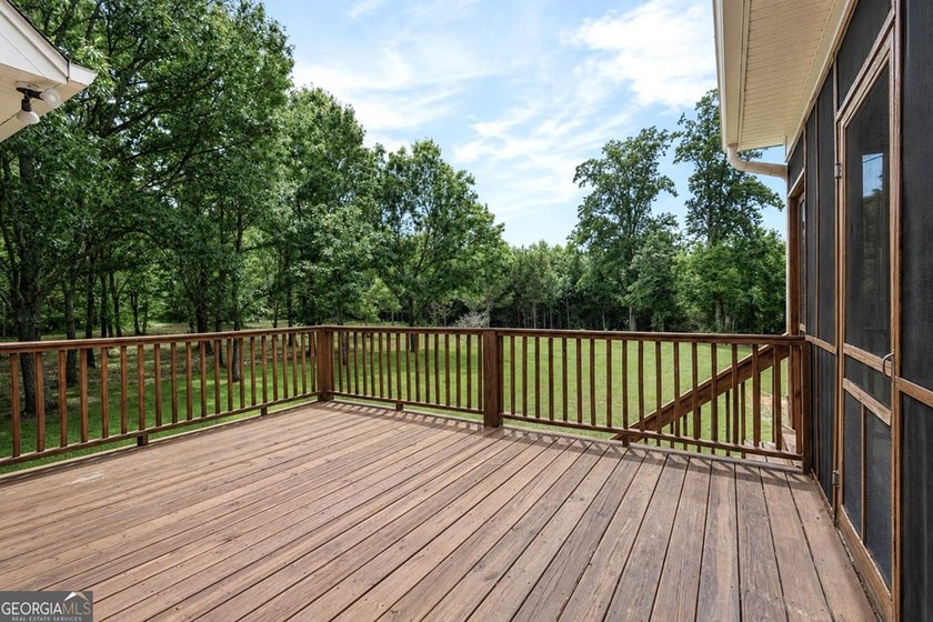 Set well back from the road and surrounded by 36 private acres - photo 41