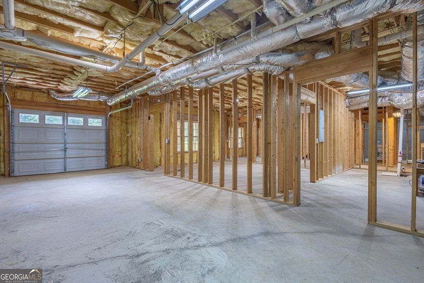 Set well back from the road and surrounded by 36 private acres - photo 45