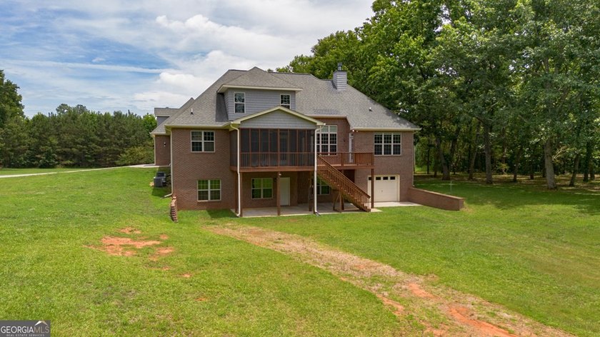 Set well back from the road and surrounded by 36 private acres - photo 50