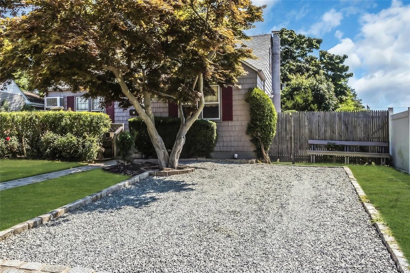 LOCATION!!! Nestled on a quiet dead end street this charming - photo 3
