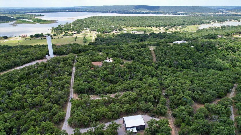 Discover a rare opportunity to own a beautiful wooded homesite - photo 8
