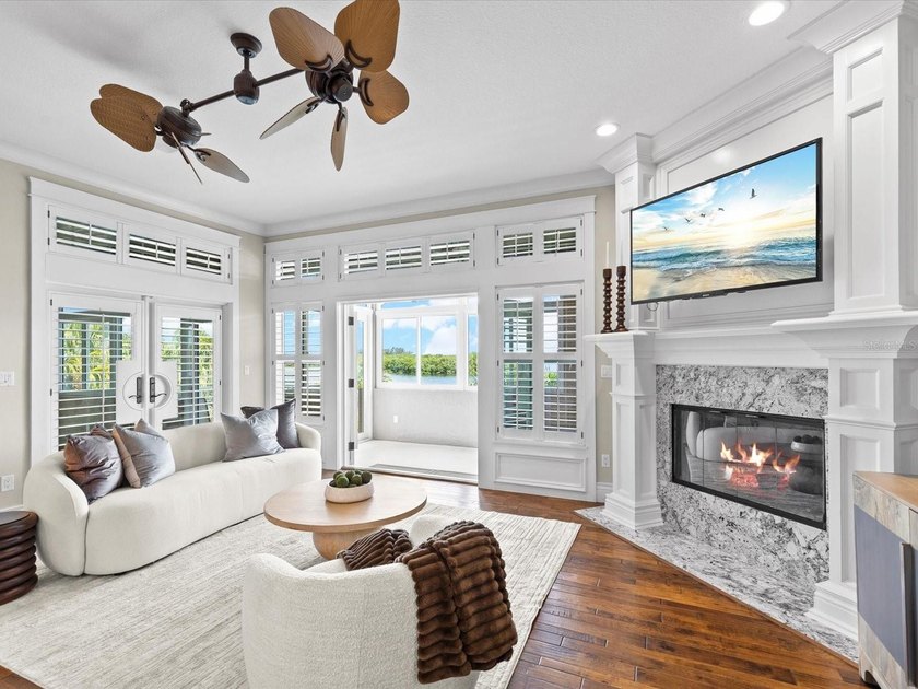 Welcome to an extraordinary waterfront estate in the prestigious - photo 10