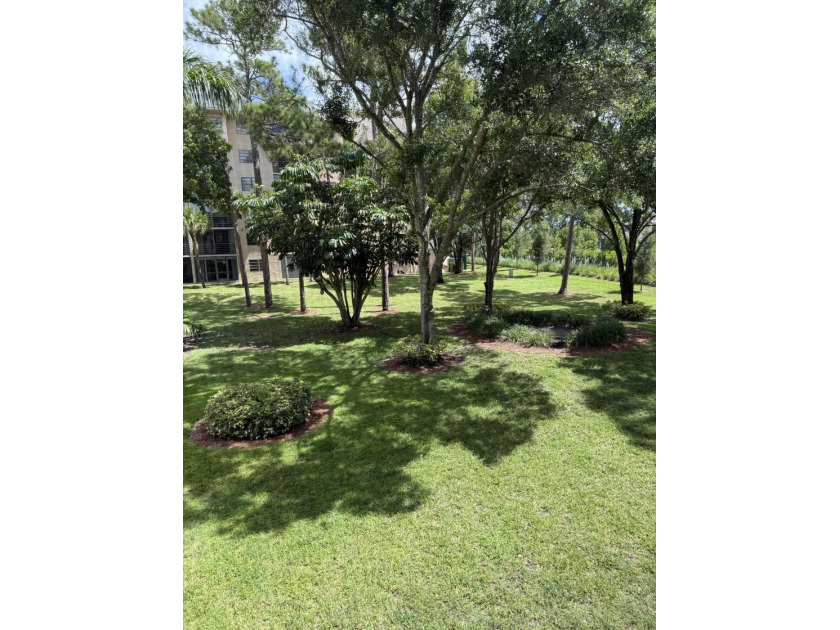Welcome to this bright 2-bedroom, 2-bathroom condominium nestled - photo 13