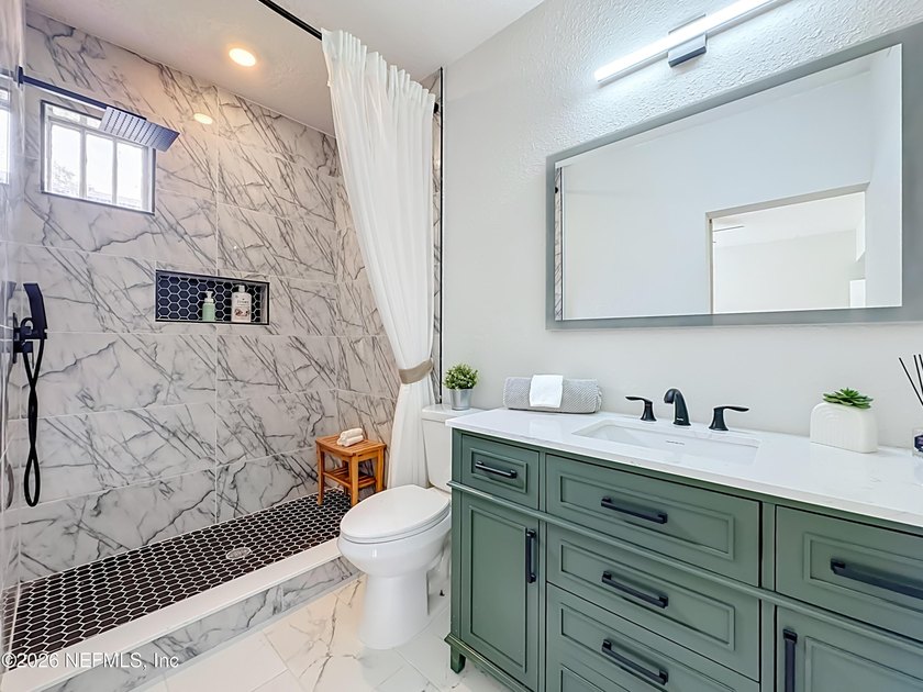 Timeless Riverside charm meets modern luxury in this beautifully - photo 22