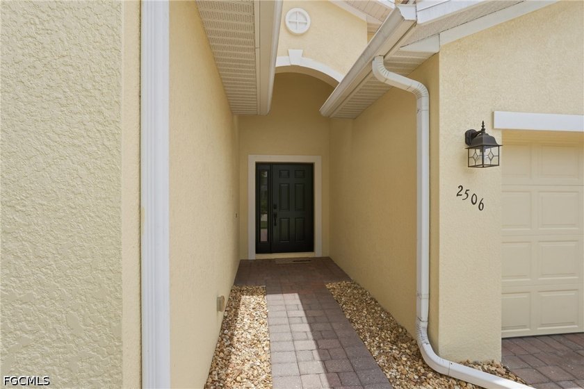 This stunning Mediterranean-inspired home offers incredible curb - photo 5
