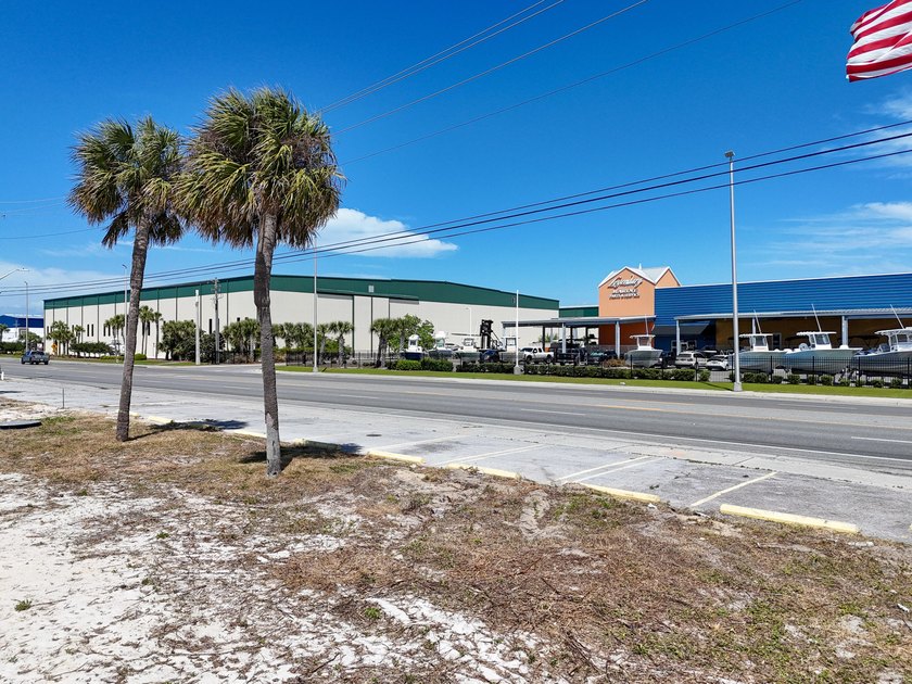 The site features 225 feet of frontage and is zoned C-3, which - photo 15