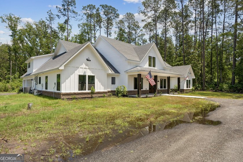 This custom-built home is situated on approximately 3 acres and - photo 11
