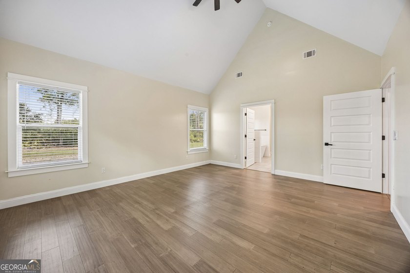 This custom-built home is situated on approximately 3 acres and - photo 32