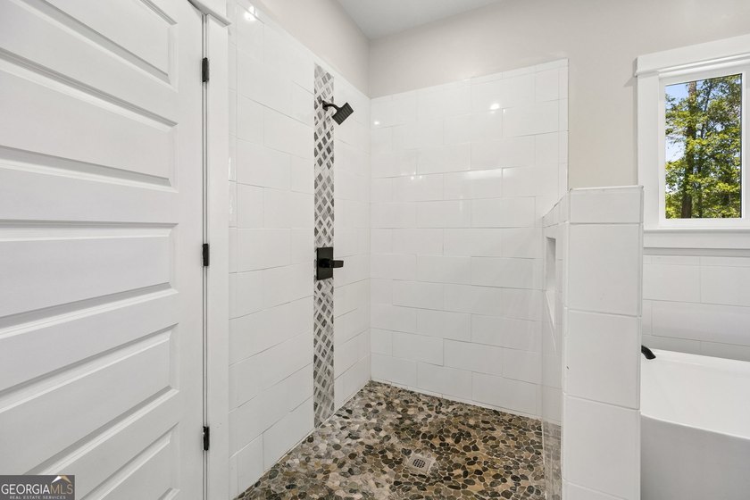 This custom-built home is situated on approximately 3 acres and - photo 34