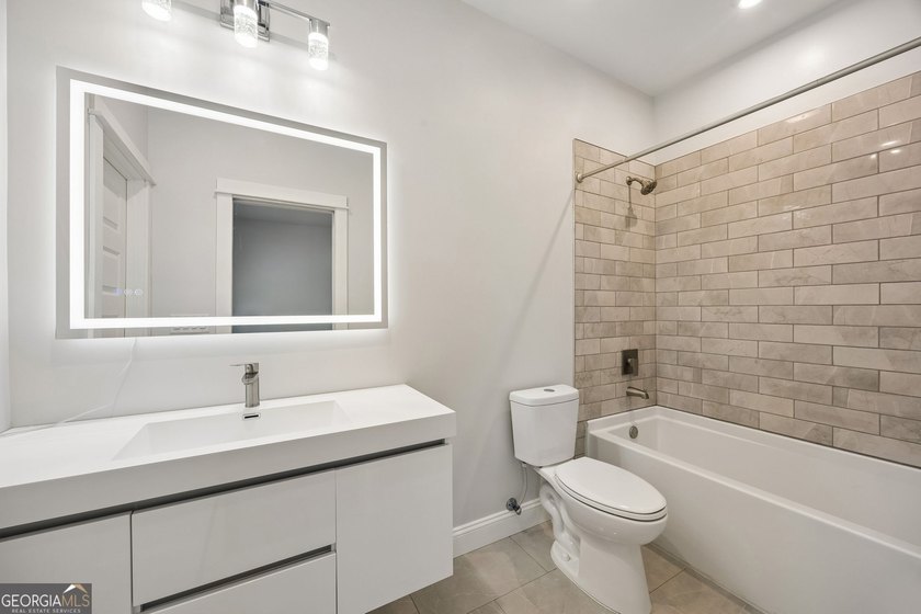 This custom-built home is situated on approximately 3 acres and - photo 39