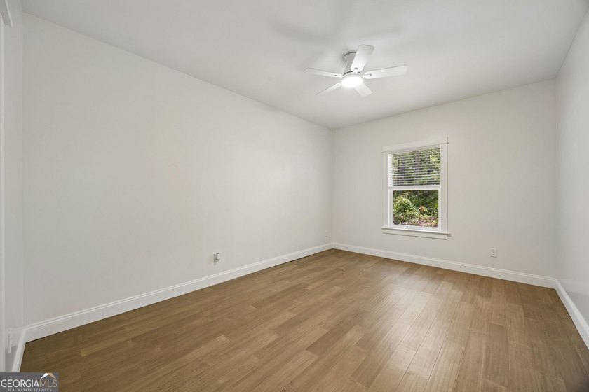 This custom-built home is situated on approximately 3 acres and - photo 40