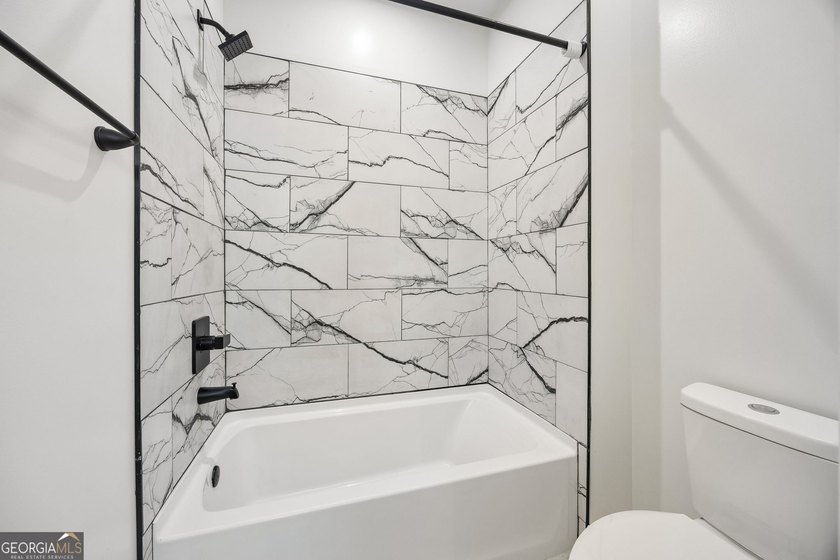 This custom-built home is situated on approximately 3 acres and - photo 43