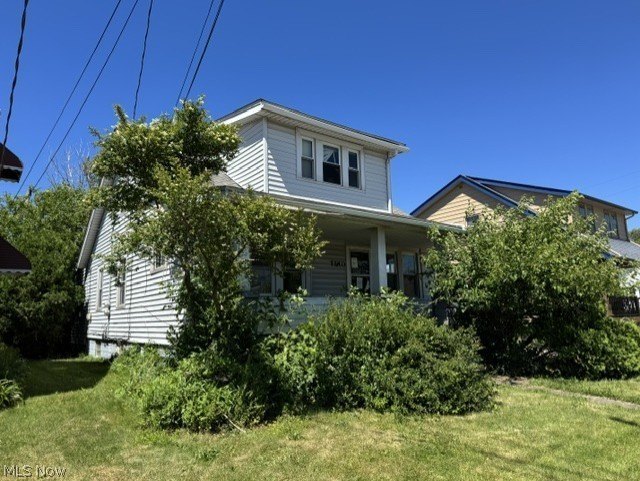 Investment Opportunity in this cape cod style home on the - photo 3