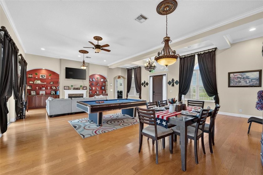 Set behind the gates of Lake Toscana, this exceptional lakefront - photo 11
