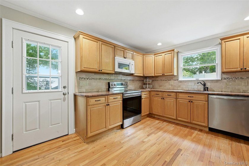 Welcome to 15 Birch Road, a four bedroom, two and a half bath - photo 7