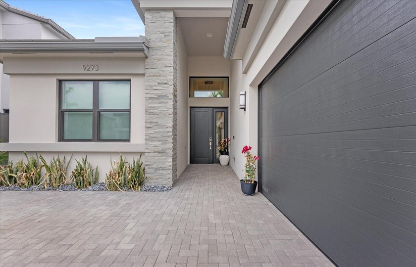 Welcome to this stunning 2025 built home in Lotus Edge, set on - photo 3