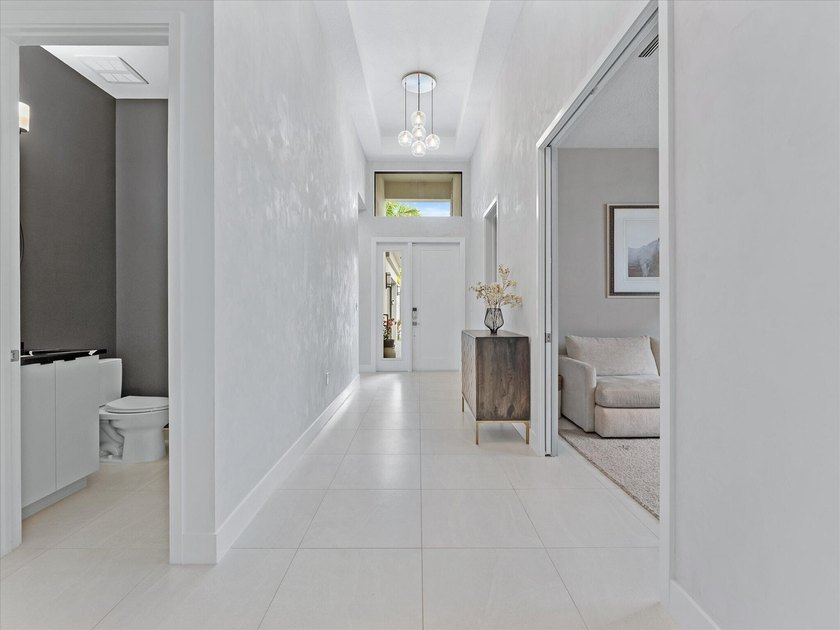 Welcome to this stunning 2025 built home in Lotus Edge, set on - photo 4