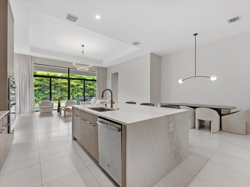 Welcome to this stunning 2025 built home in Lotus Edge, set on - photo 6