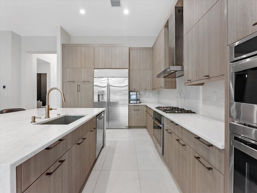 Welcome to this stunning 2025 built home in Lotus Edge, set on - photo 9