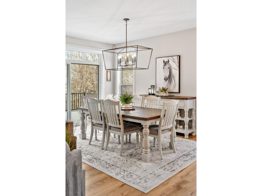 Luxury, low-maintenance living meets peaceful wooded privacy in - photo 18