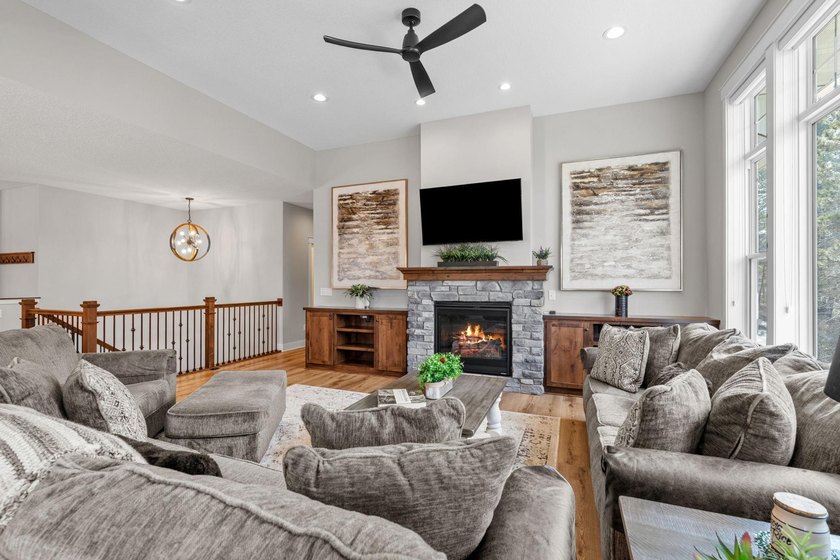 Luxury, low-maintenance living meets peaceful wooded privacy in - photo 20