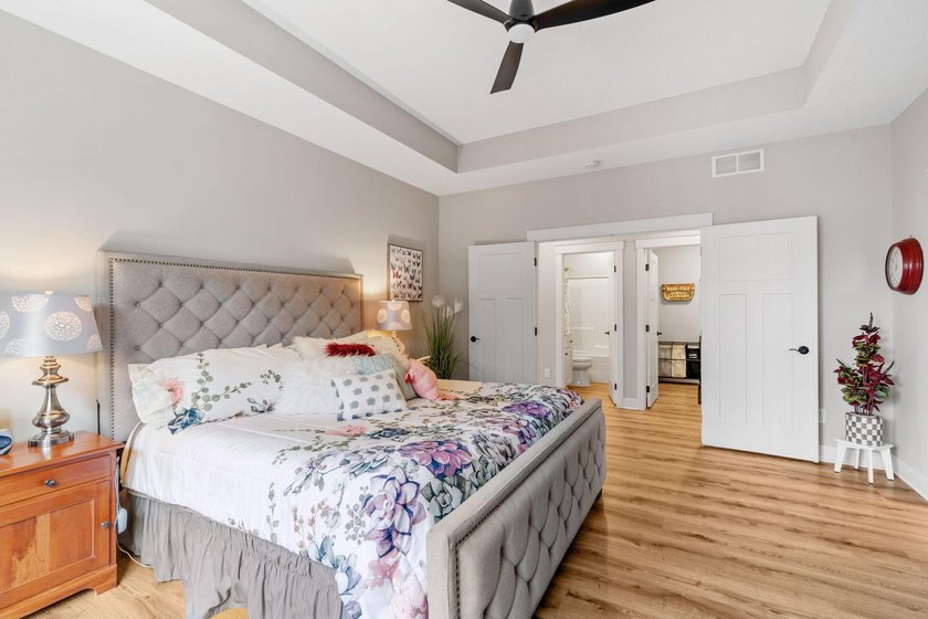 Luxury, low-maintenance living meets peaceful wooded privacy in - photo 28