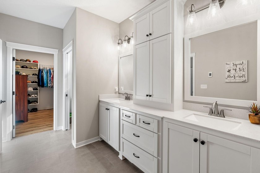 Luxury, low-maintenance living meets peaceful wooded privacy in - photo 32