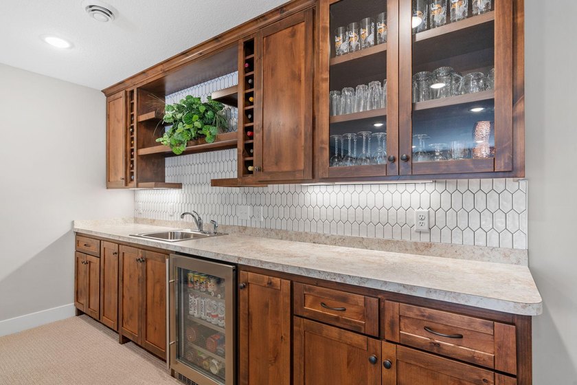Luxury, low-maintenance living meets peaceful wooded privacy in - photo 39