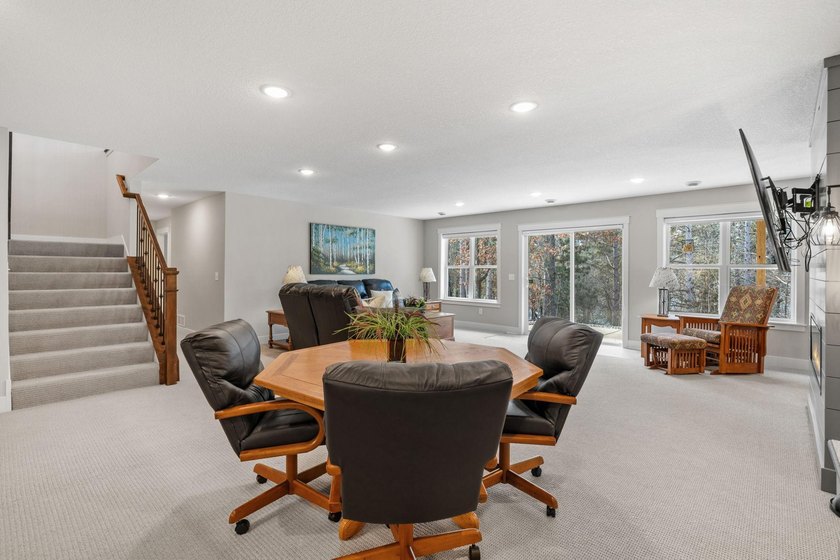 Luxury, low-maintenance living meets peaceful wooded privacy in - photo 40