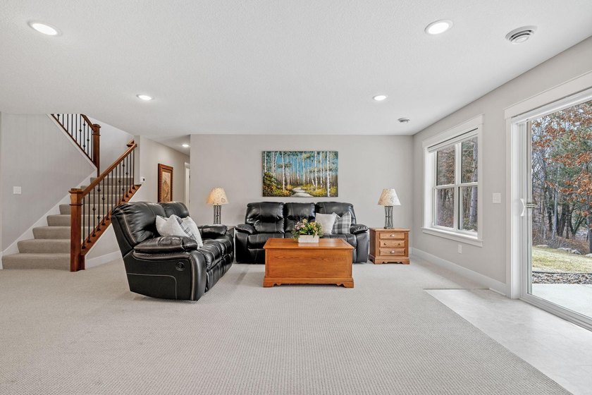 Luxury, low-maintenance living meets peaceful wooded privacy in - photo 41
