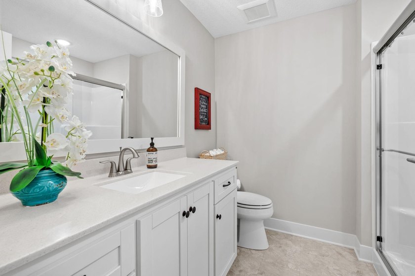 Luxury, low-maintenance living meets peaceful wooded privacy in - photo 50