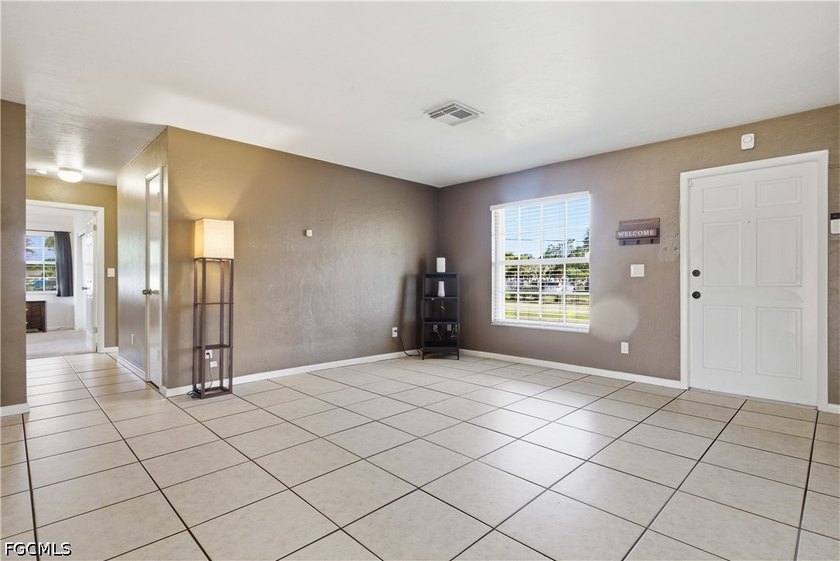 Beautiful 3-bedroom, 2-bath home with a 2-car garage situated on - photo 3