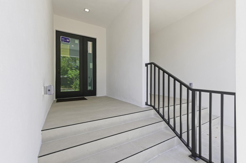 Introducing a newly built 3-bedroom, 3.5-bath luxury townhome in - photo 4