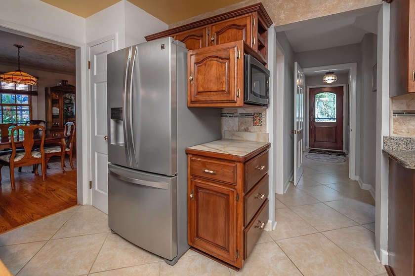 Your'e gonna love this handsome brick colonial nestled on a - photo 21