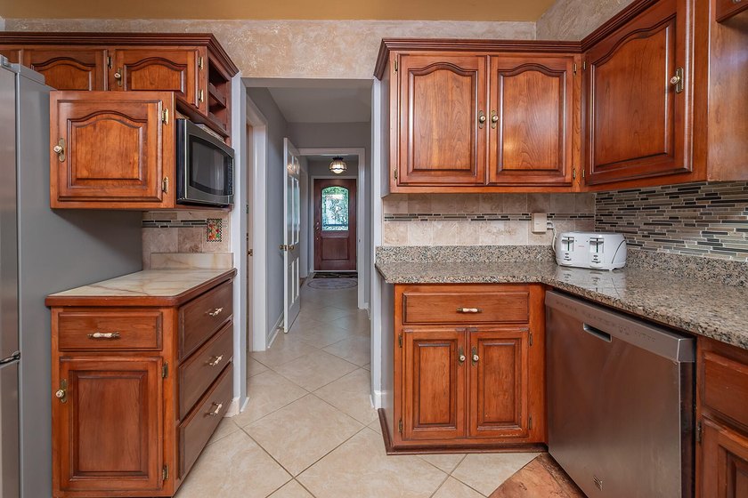 Your'e gonna love this handsome brick colonial nestled on a - photo 22