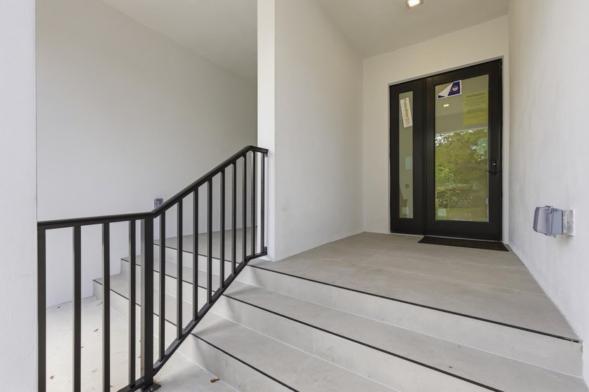 A refined new construction residence in historic Sailboat Bend - photo 6